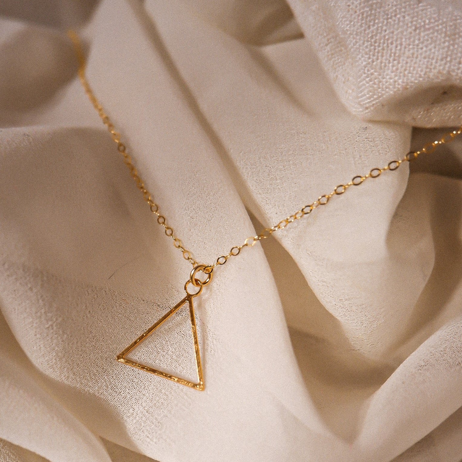 simple gold triangle necklace