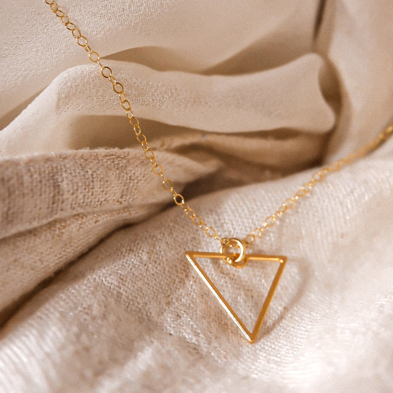 simple gold triangle necklace
